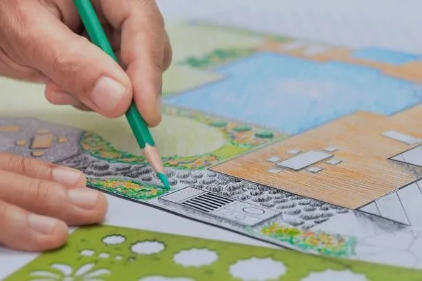 Landscape design drawing — A scaled plan drawing in progress — beds, hardscape, and planting worked out on paper first.